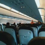 Aircraft cabin with overhead lockers, relevant to guitar cabin baggage rules