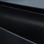 Close-up of woven carbon fibre texture, the composite material family used in the LAVA ME 4 body