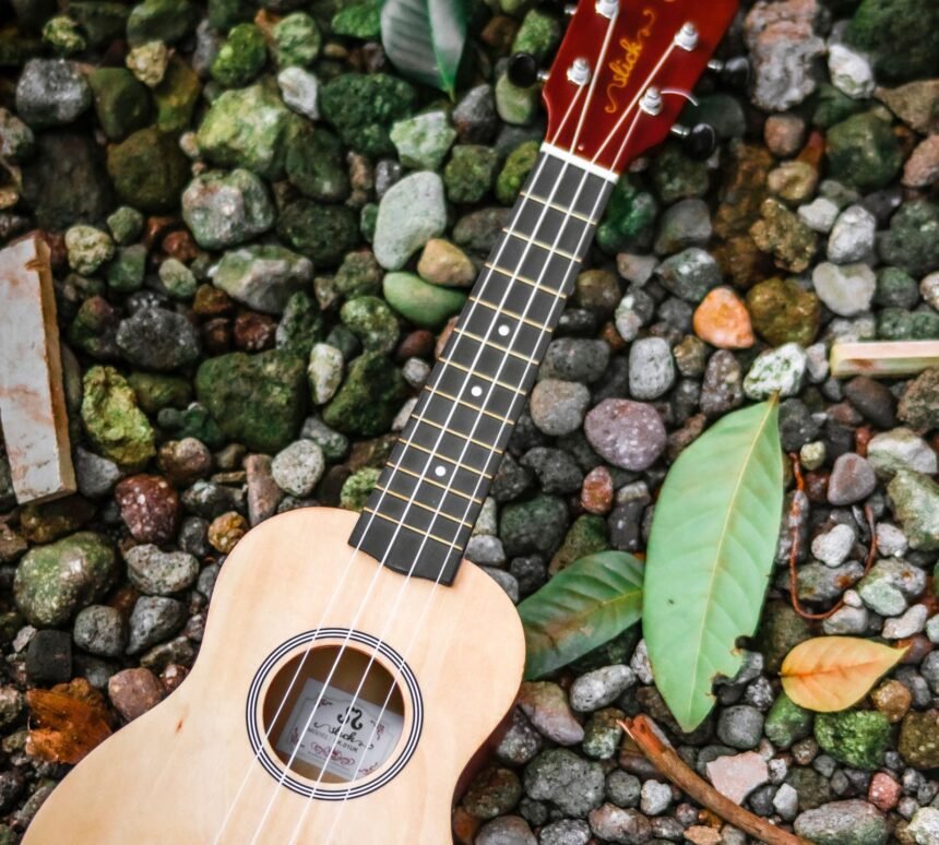 Small nylon-string travel instrument similar in body shape to the Yamaha GL1 Guitalele