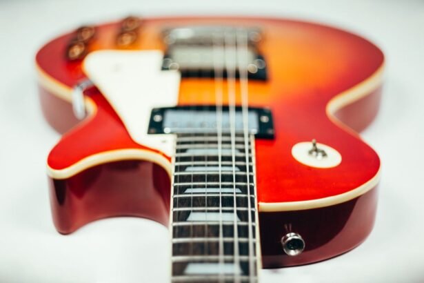 Close-up of an electric guitar body and humbucker pickup
