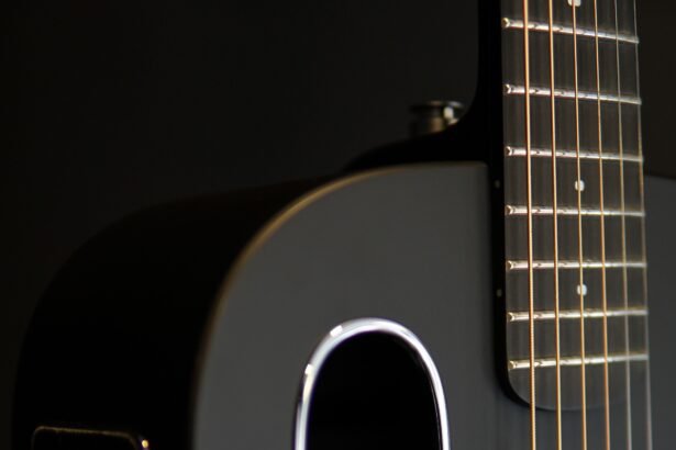 Close-up of a sleek, modern carbon-fibre guitar body and soundhole, illustrating the LAVA ME Air's design